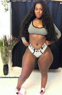 A tight teen poses and